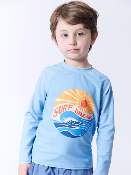 Remera manga larga uv Surf Break Celeste
