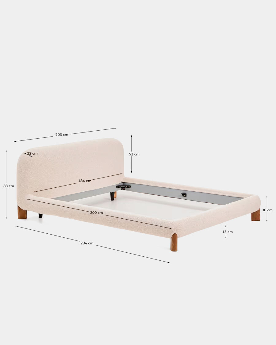 Cama desenfundable Odina bouclé crudo y patas de madera maciza de fresno acabado tono nogal para colchón de 180 x 200 cm