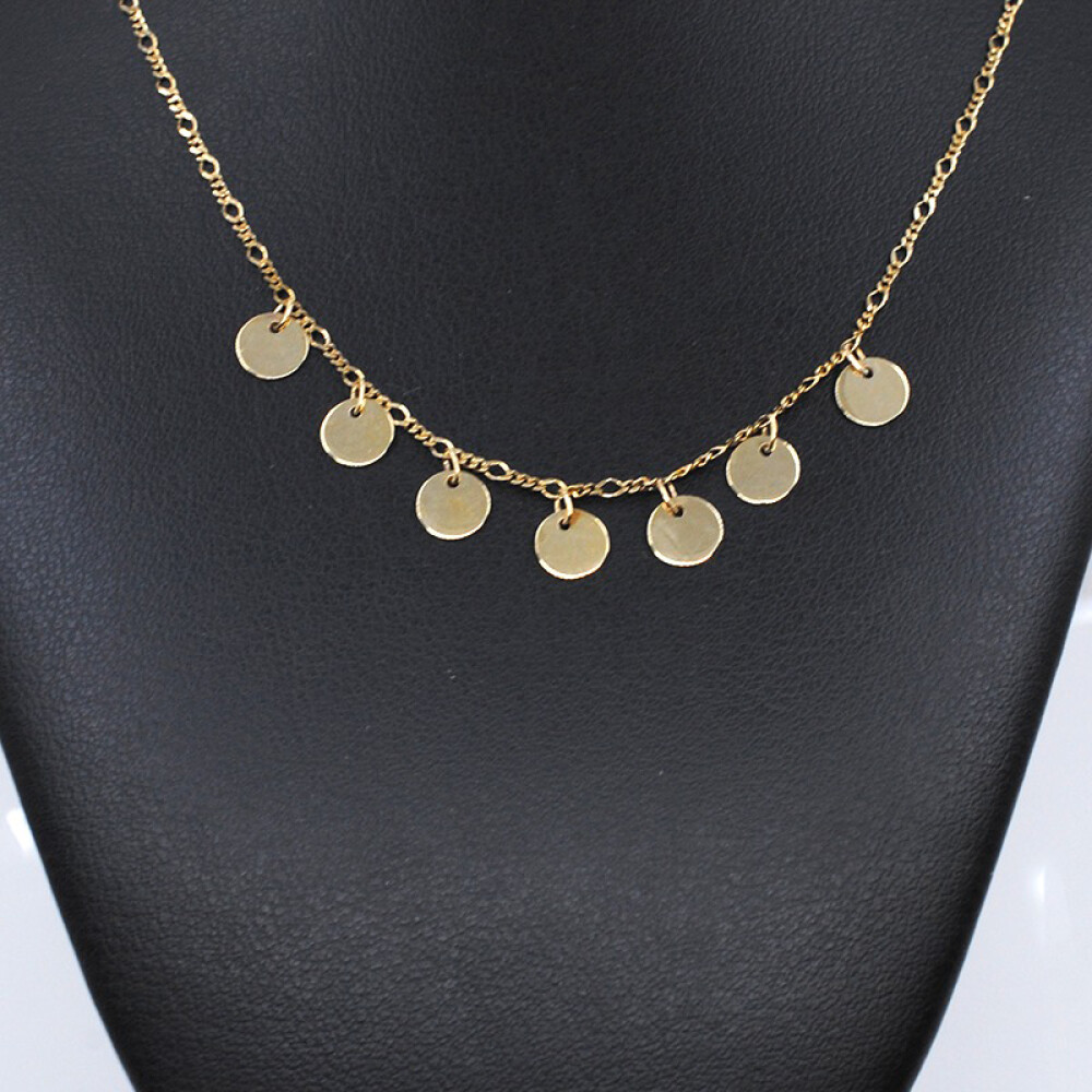 Cadena en oro 18k con 7 medallitas de oro Cadena en oro 18k con 7 medallitas de oro
