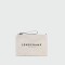 Longchamp -Sobre plano de material textil con logo Marfil