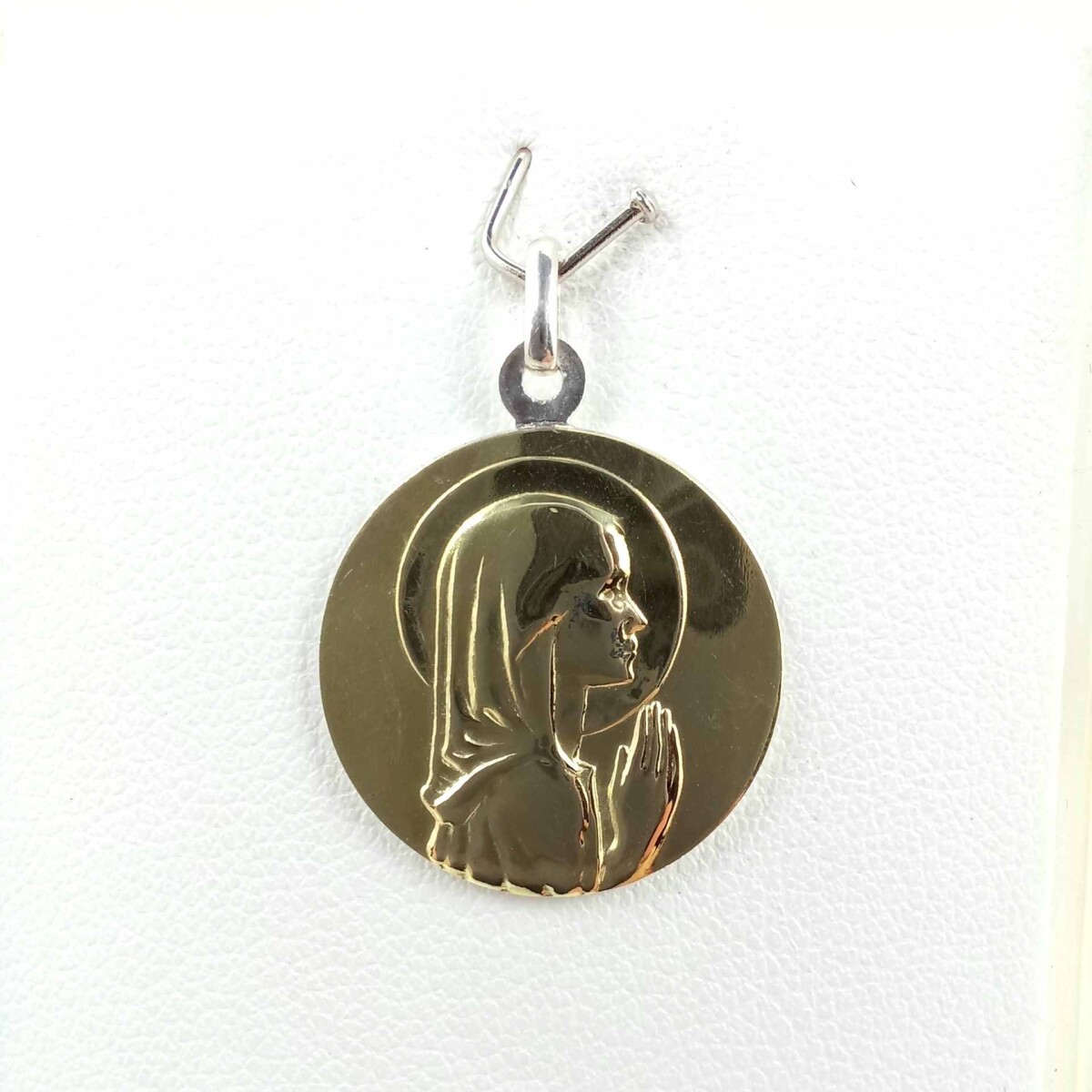 Medalla de plata 925 y double de oro 18k. Virgen niña. 