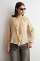 Blusa con volados beige
