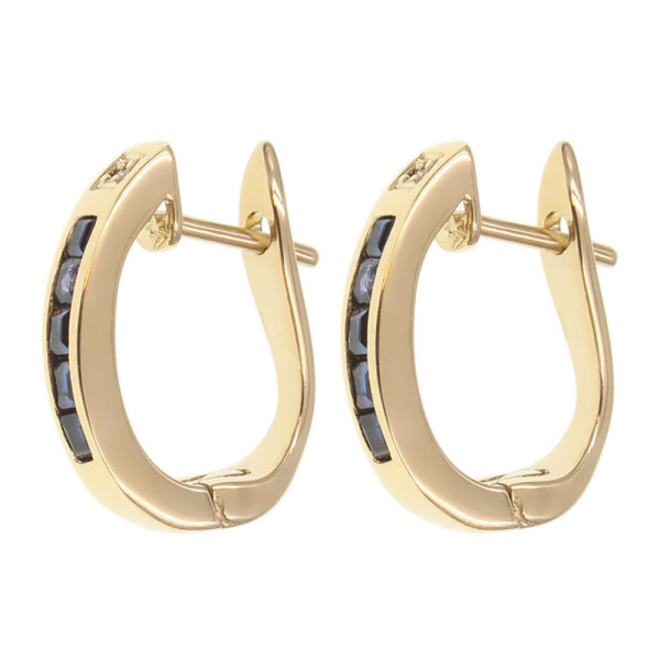 Caravanas Mia en oro amarillo 18k con brillantes y zafiro azul Caravanas Mia en oro amarillo 18k con brillantes y zafiro azul