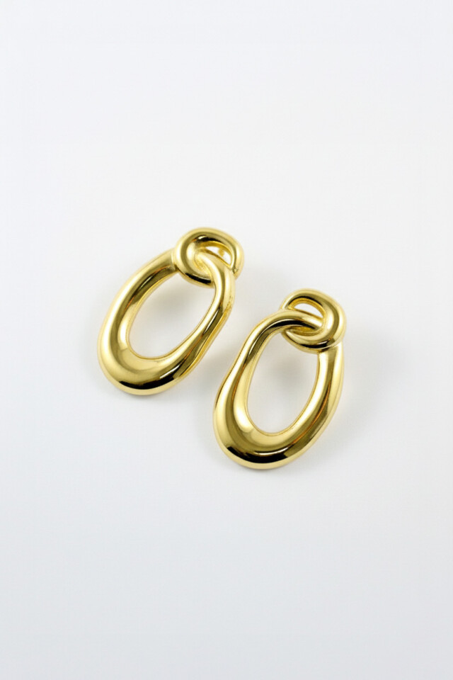 Caravanas de acero forma orgánica dorado