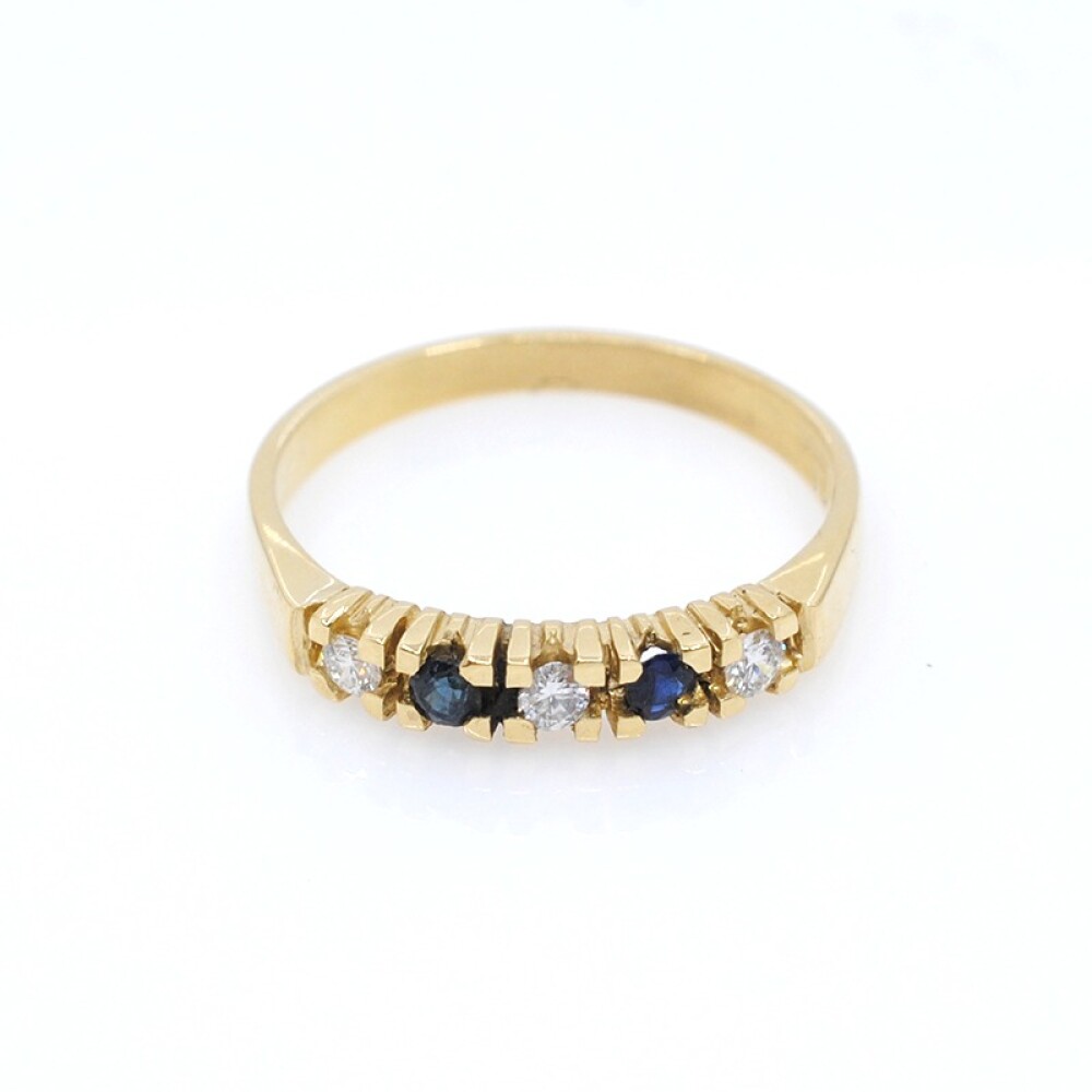 Anillo medio sin fin en oro 18K con brillantes y zafiros Anillo medio sin fin en oro 18K con brillantes y zafiros