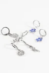 Set de caravanas floral plateado