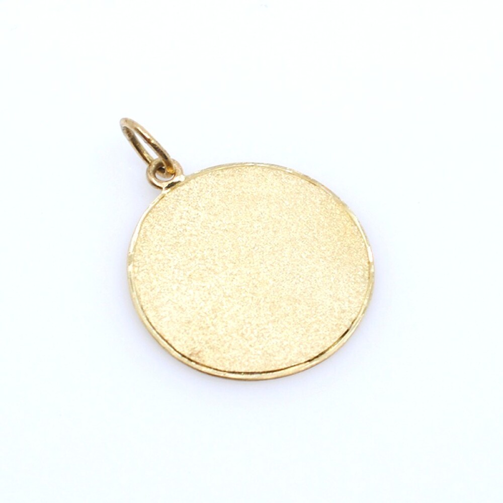 Medalla en oro 18k amarillo. Díametro 20mm Medalla en oro 18k amarillo. Díametro 20mm