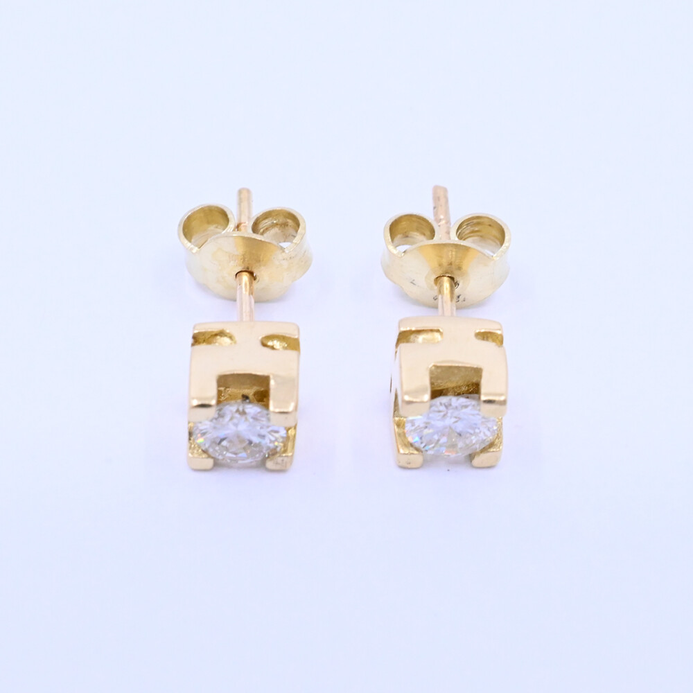 Caravanas oro 18k amarillo engarce 4 puntas con brillantes Caravanas oro 18k amarillo engarce 4 puntas con brillantes