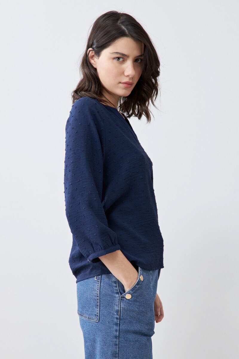 Blusa fantasía escote V azul marino