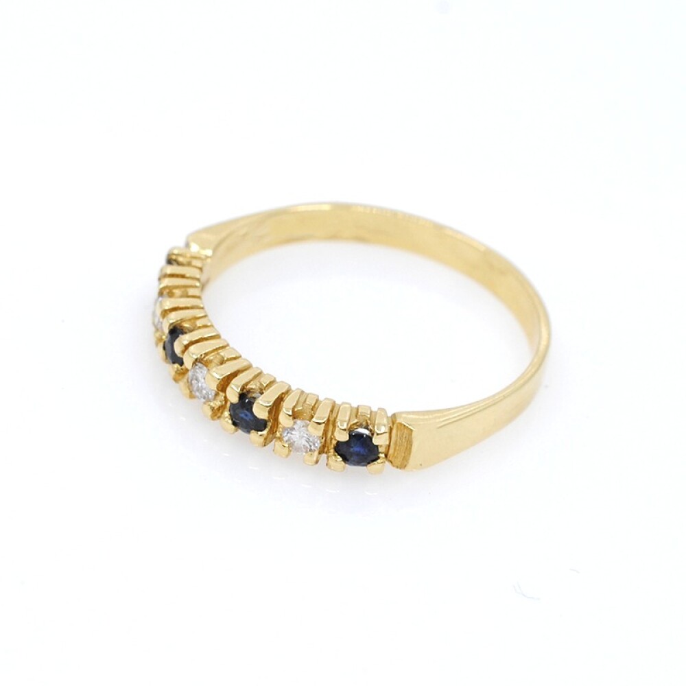 Anillo en oro 18k , brillantes y zafiros Anillo en oro 18k , brillantes y zafiros