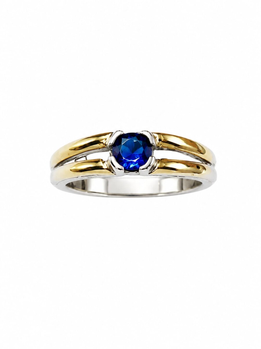 Anillo con zirconia azul al centro 