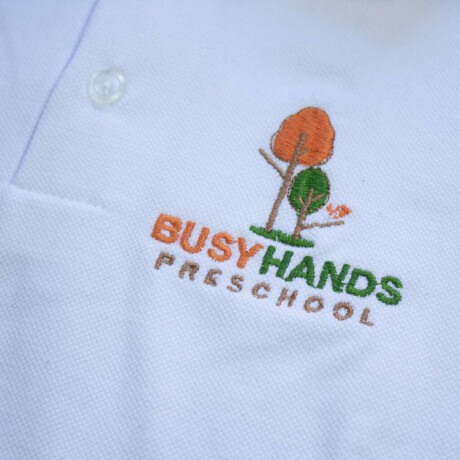 Remera polo Busy Hands Kinder