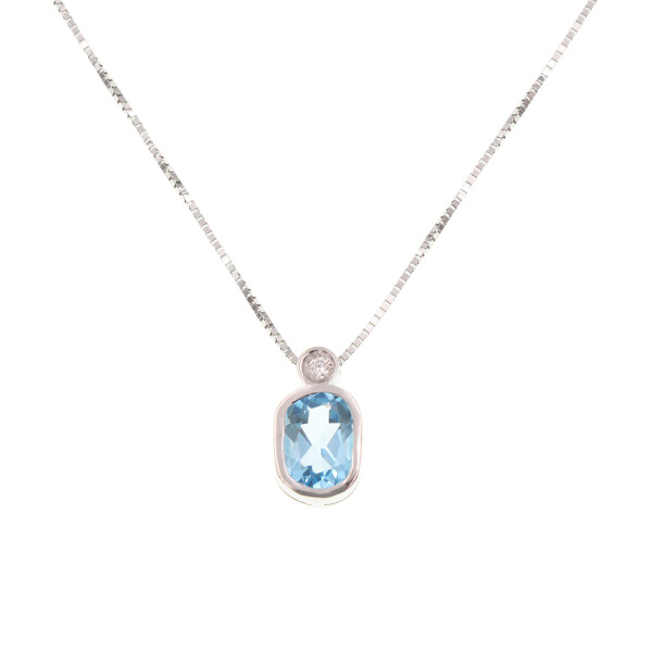 Colgante Silvia de oro blanco 18k con brillante y topacio azul. Incluye cadena Colgante Silvia de oro blanco 18k con brillante y topacio azul. Incluye cadena