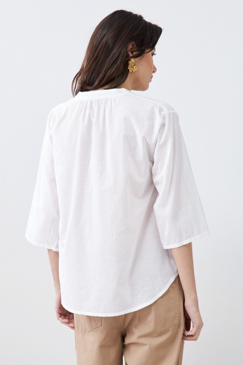 Blusa con círculos aplicados blanco