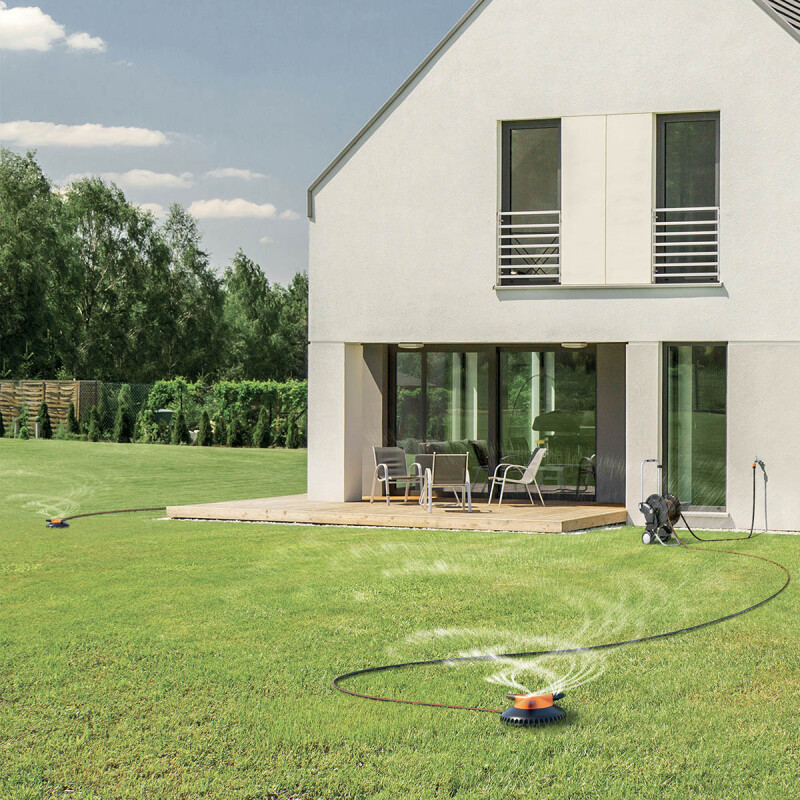 Aspersor giratorio de tres brazos Aspersor giratorio de tres brazos