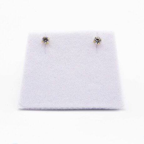 Caravanas de oro 10Ktes, con circonia de 4mm, sistema de cierre perno y rosca. Caravanas de oro 10Ktes, con circonia de 4mm, sistema de cierre perno y rosca.