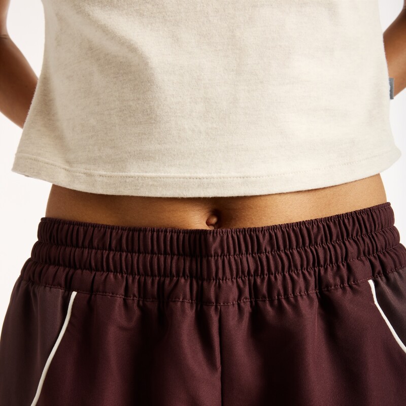 Pantalón Lifestyle New Balance de Dama Trackside WB62O9UFYLR BROWN