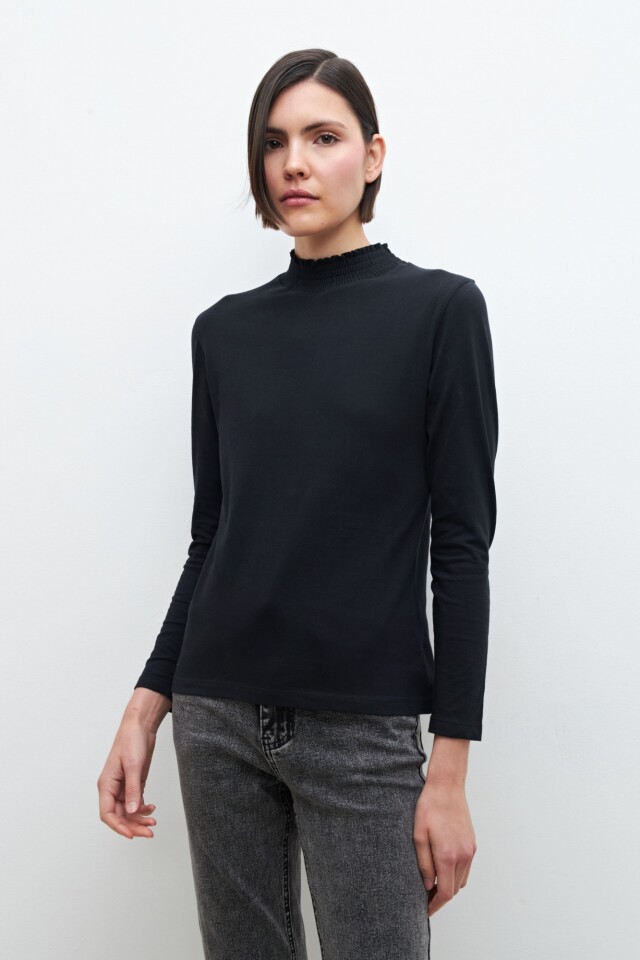 Media polera punto smock negro