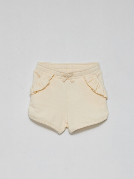 Short deportivo Volados crema