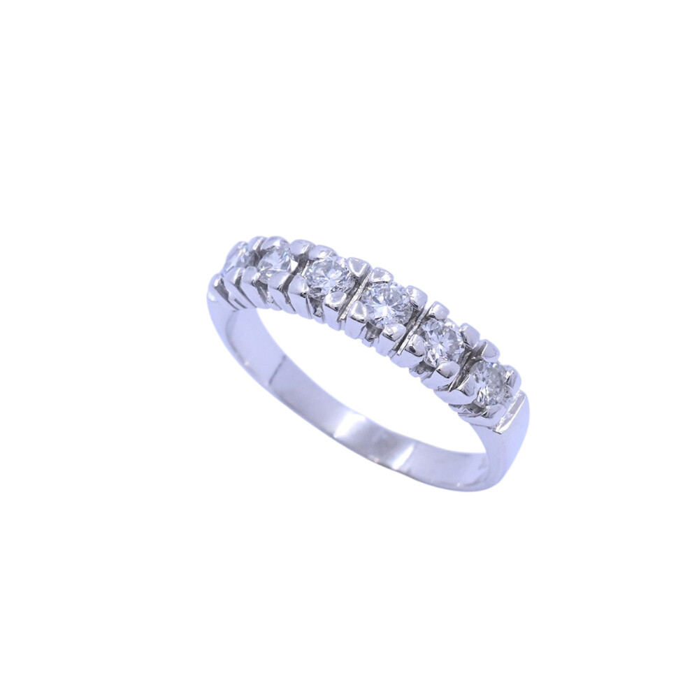 Anillo medio sin fin oro 18k blanco con brillantes engarce 4 puntas Anillo medio sin fin oro 18k blanco con brillantes engarce 4 puntas
