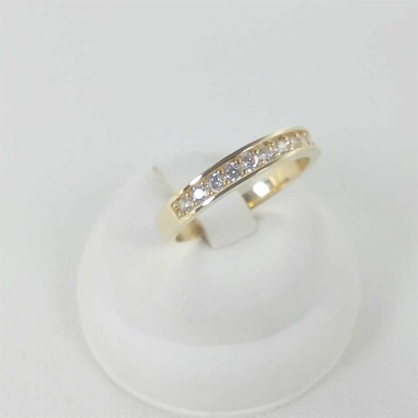 Anillo de oro 9 ktes con 11 circonias. Medio sin fin Anillo de oro 9 ktes con 11 circonias. Medio sin fin