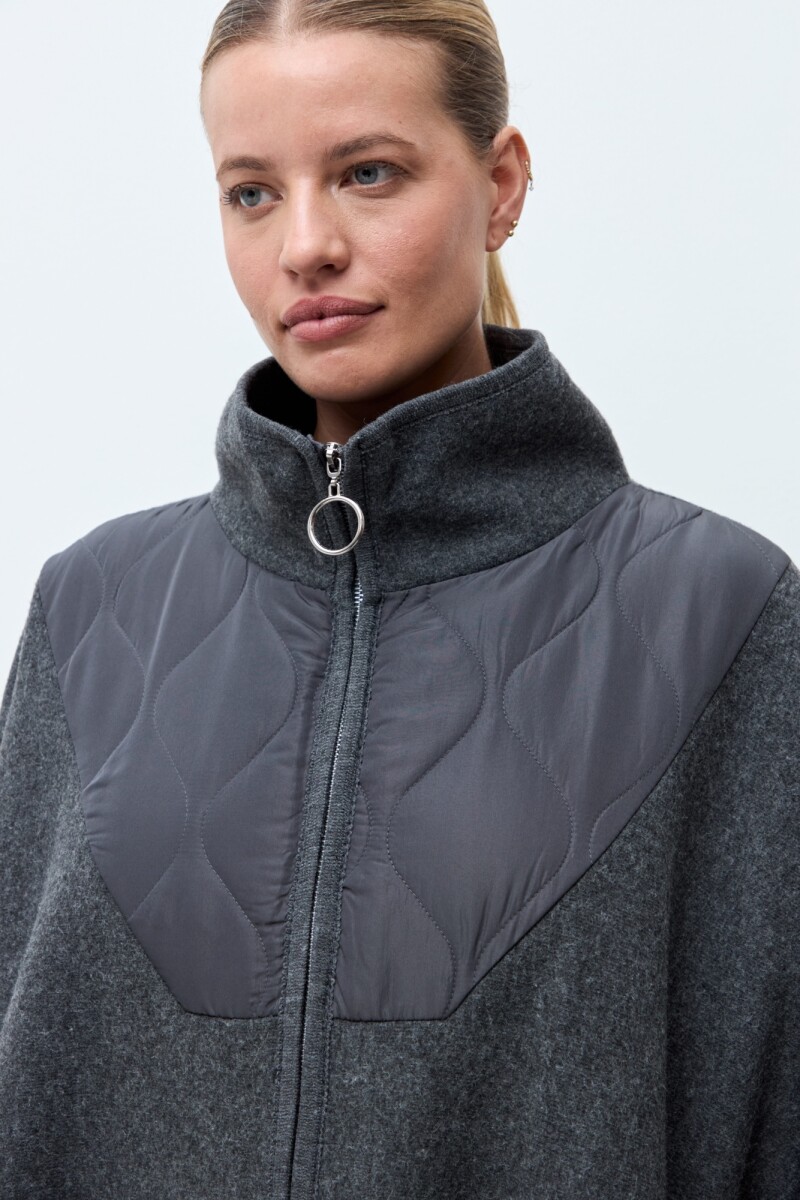 Capa detalle capitoneado gris melange