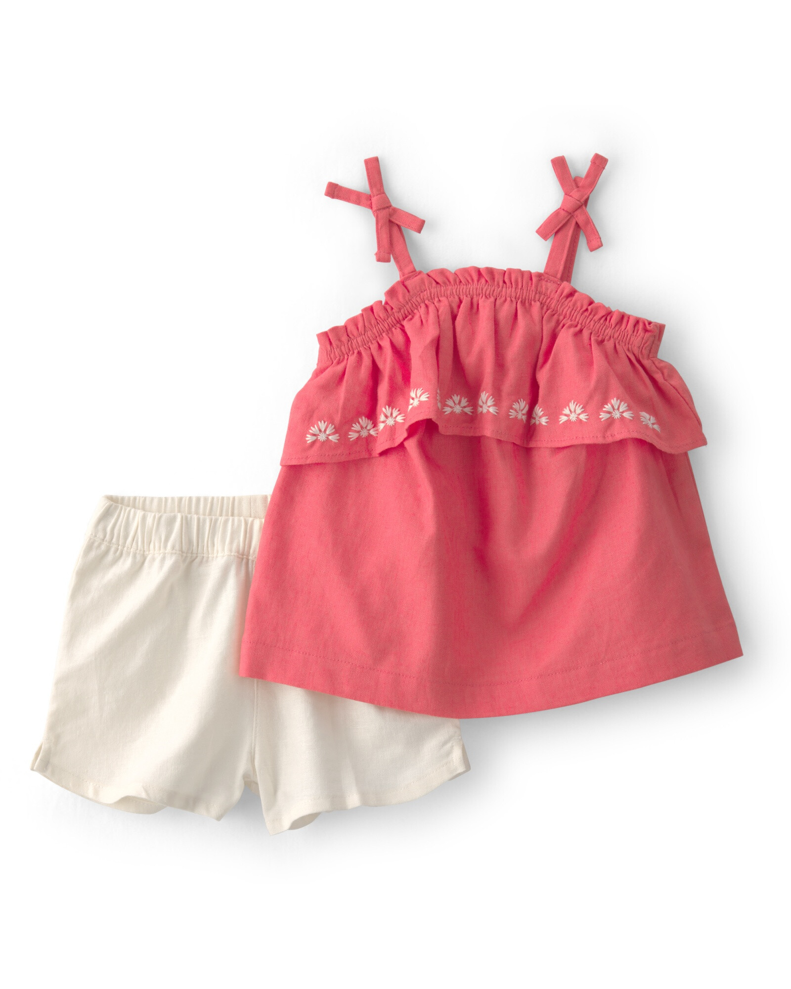 Set dos piezas de lino, short marfil y musculosa coral Set dos piezas de lino, short marfil y musculosa coral