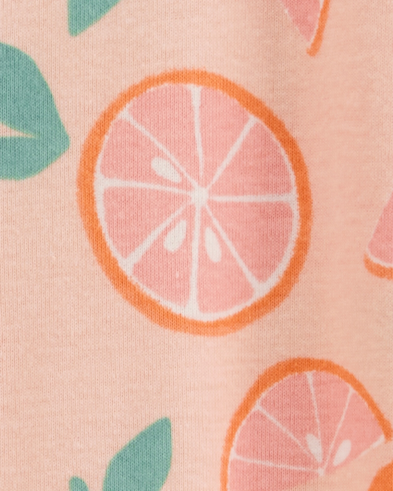 Pijama una pieza de algodón, con pie, anaranjado, diseño naranjas. Talles 2-5T Pijama una pieza de algodón, con pie, anaranjado, diseño naranjas. Talles 2-5T