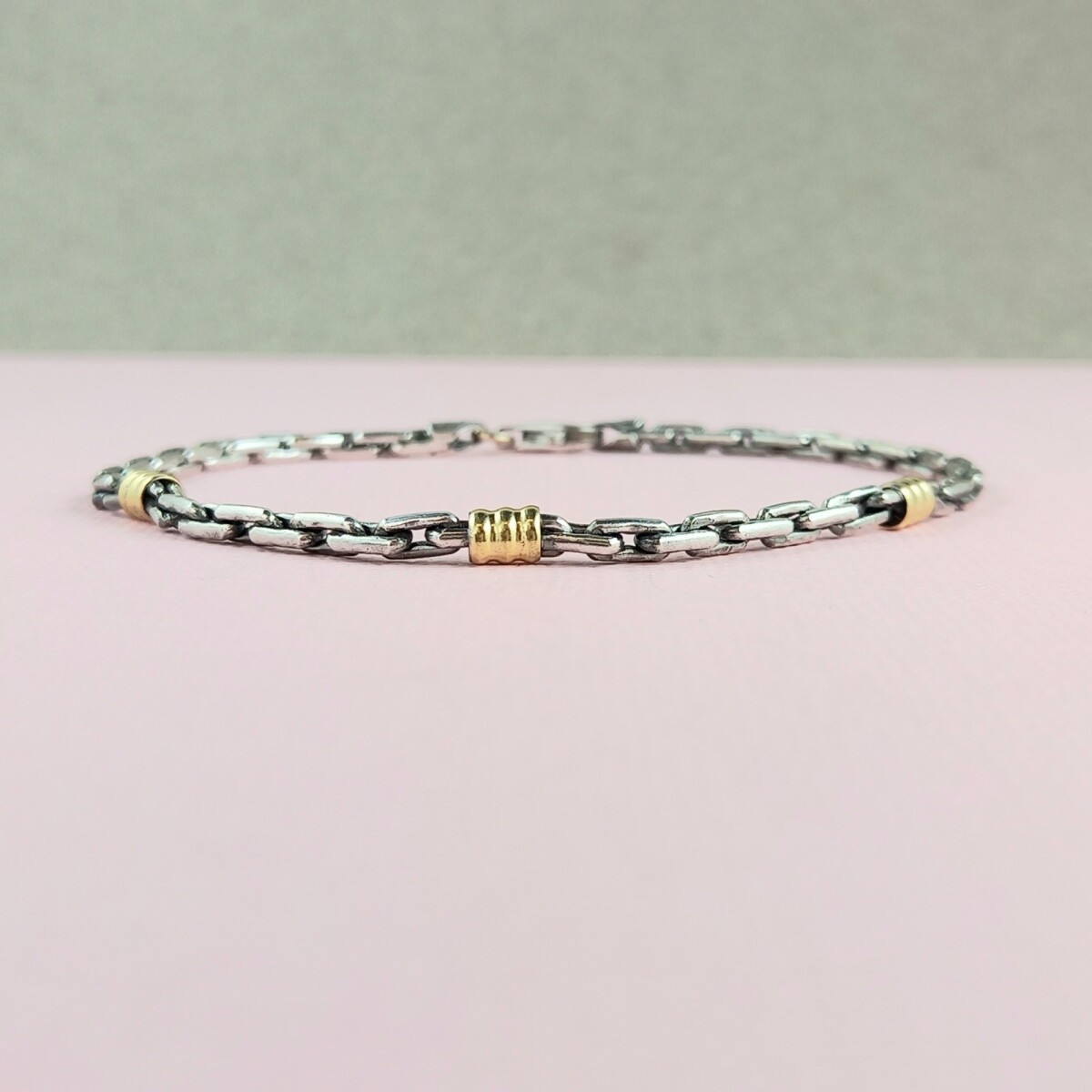 Pulsera de plata 925 con detalles en double de oro 18 ktes. 