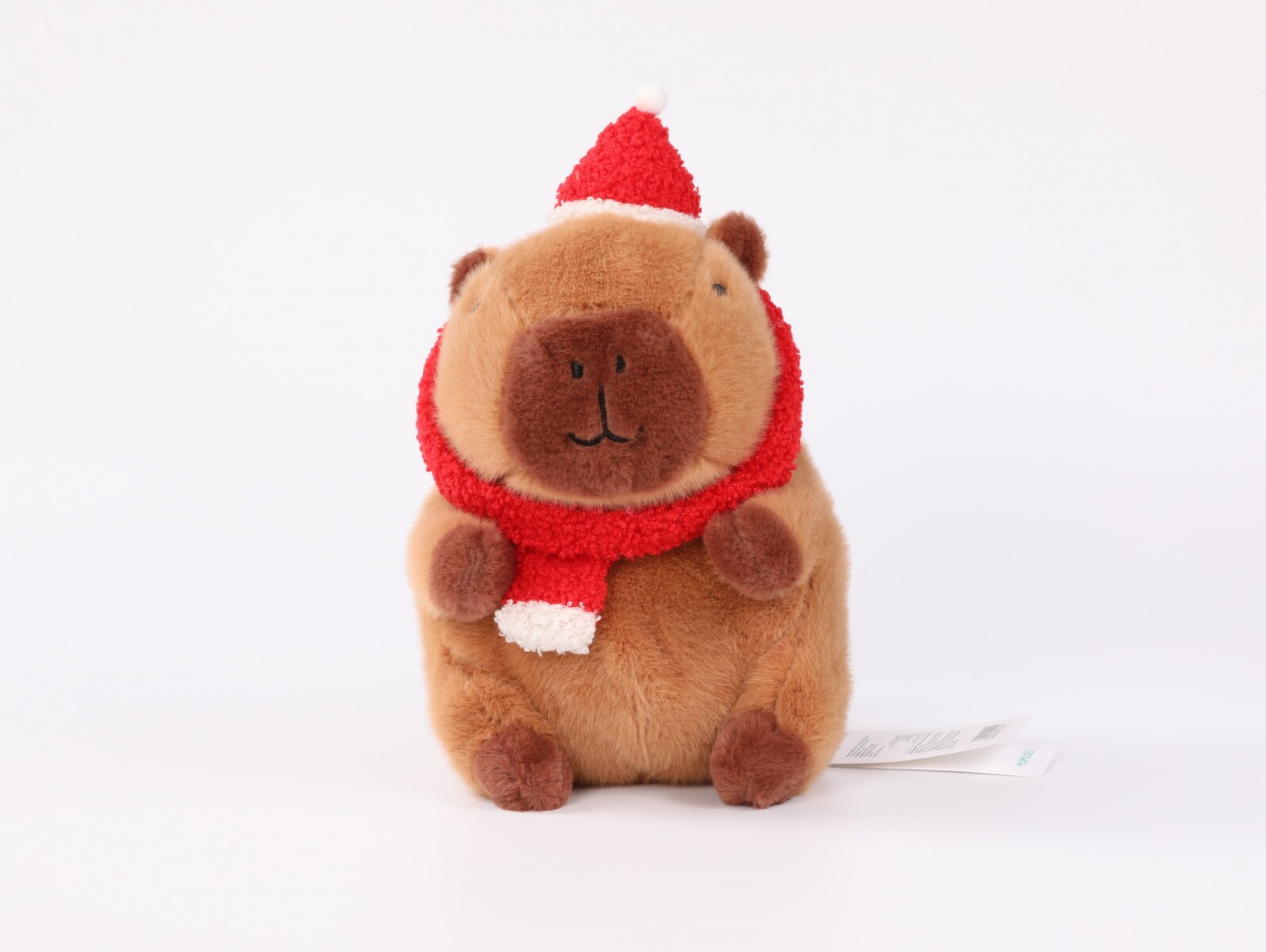 PELUCHE NAVIDEÑO DE 29 CM (CAPIBARA CON SOMBRERO ROJO Y BUFANDA) 