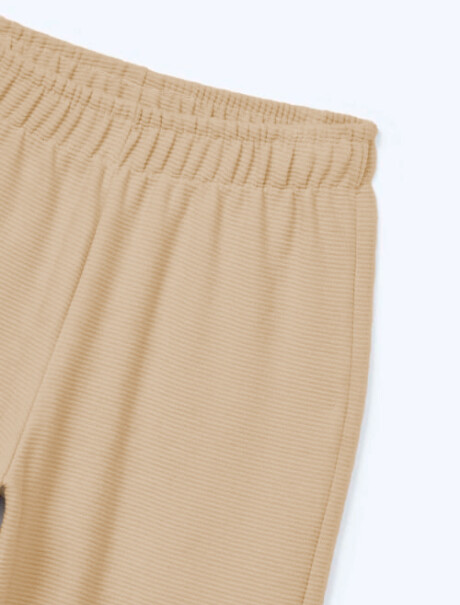 CONJUNTO INFANTIL CON ESTAMPA BEIGE