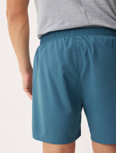 BERMUDA CON BOLSILLO AZUL