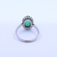 Anillo oro 14k esmeralda oval central y brillantes. Anillo oro 14k esmeralda oval central y brillantes.