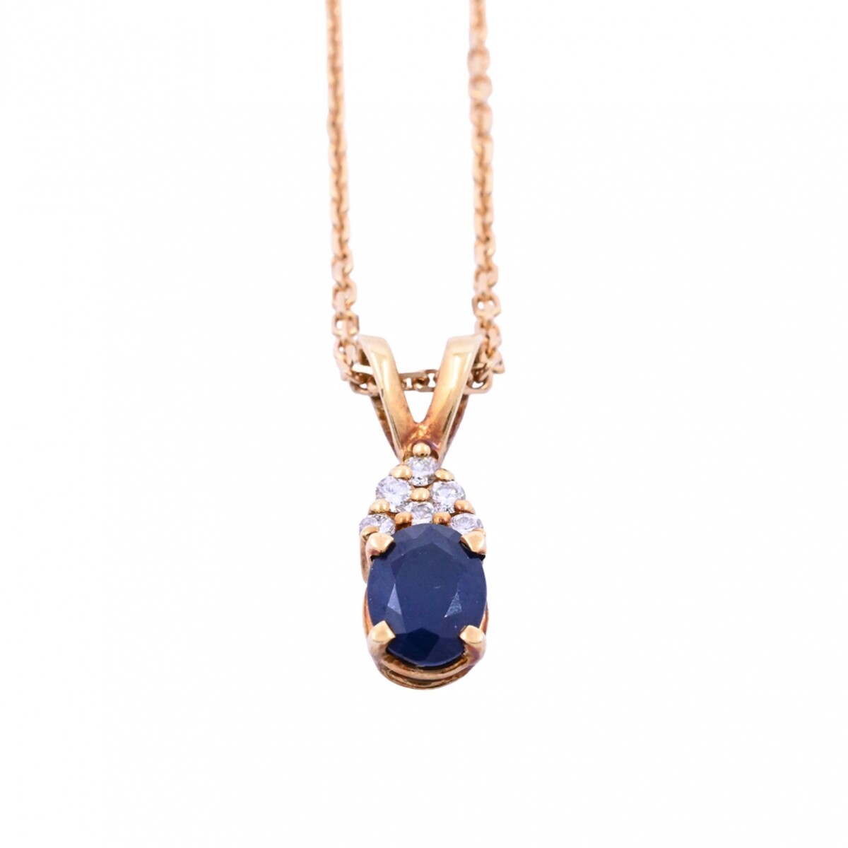 Colgante oro 18k con brillantes y zafiro. 
