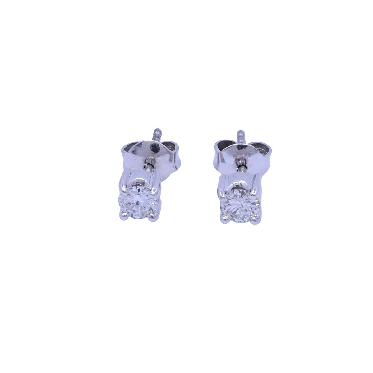 Caravanas oro 18k blanco engarce 4 puntas con brillantes. 