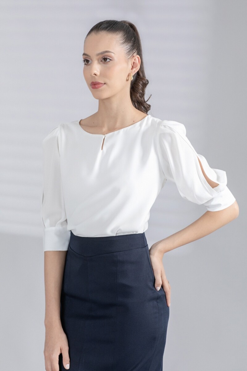 Blusa Mangas 3/4. 