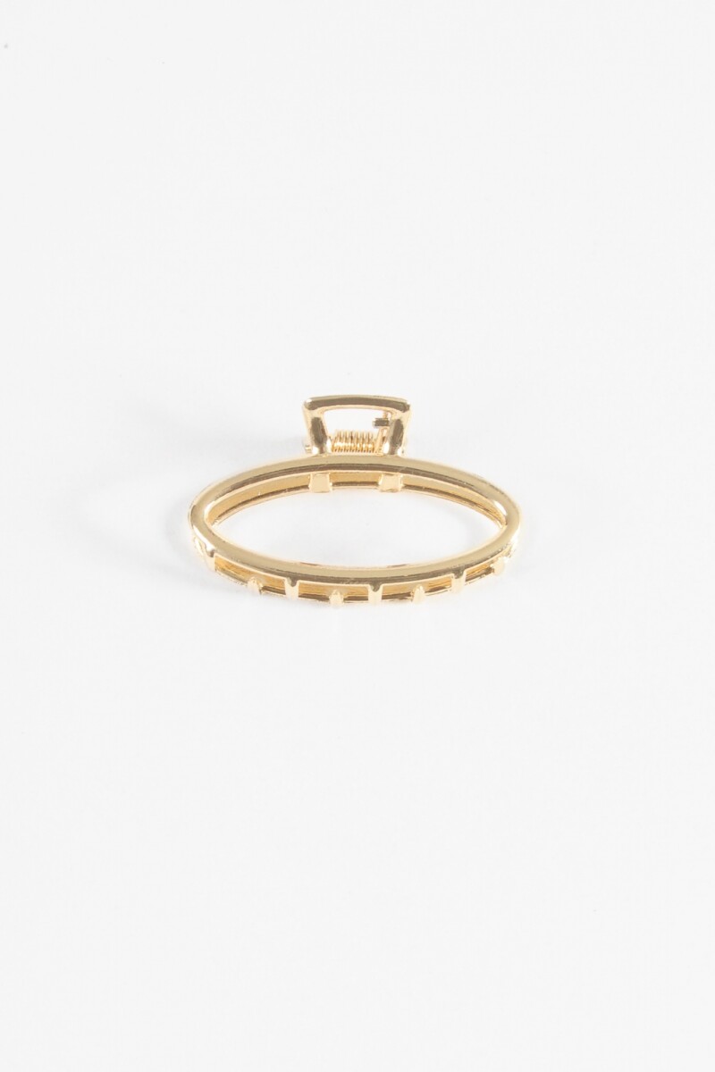 Broche ovalado metálico dorado