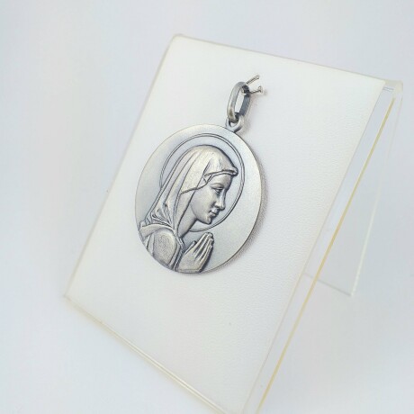 Medalla religiosa Virgen Maria, medidas diámetro 4cm, material alpaca. Medalla religiosa Virgen Maria, medidas diámetro 4cm, material alpaca.