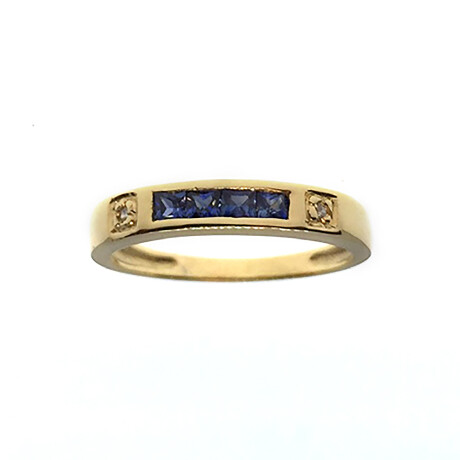 Anillo Tana de oro amarillo 18k con brillantes y zafiros Anillo Tana de oro amarillo 18k con brillantes y zafiros
