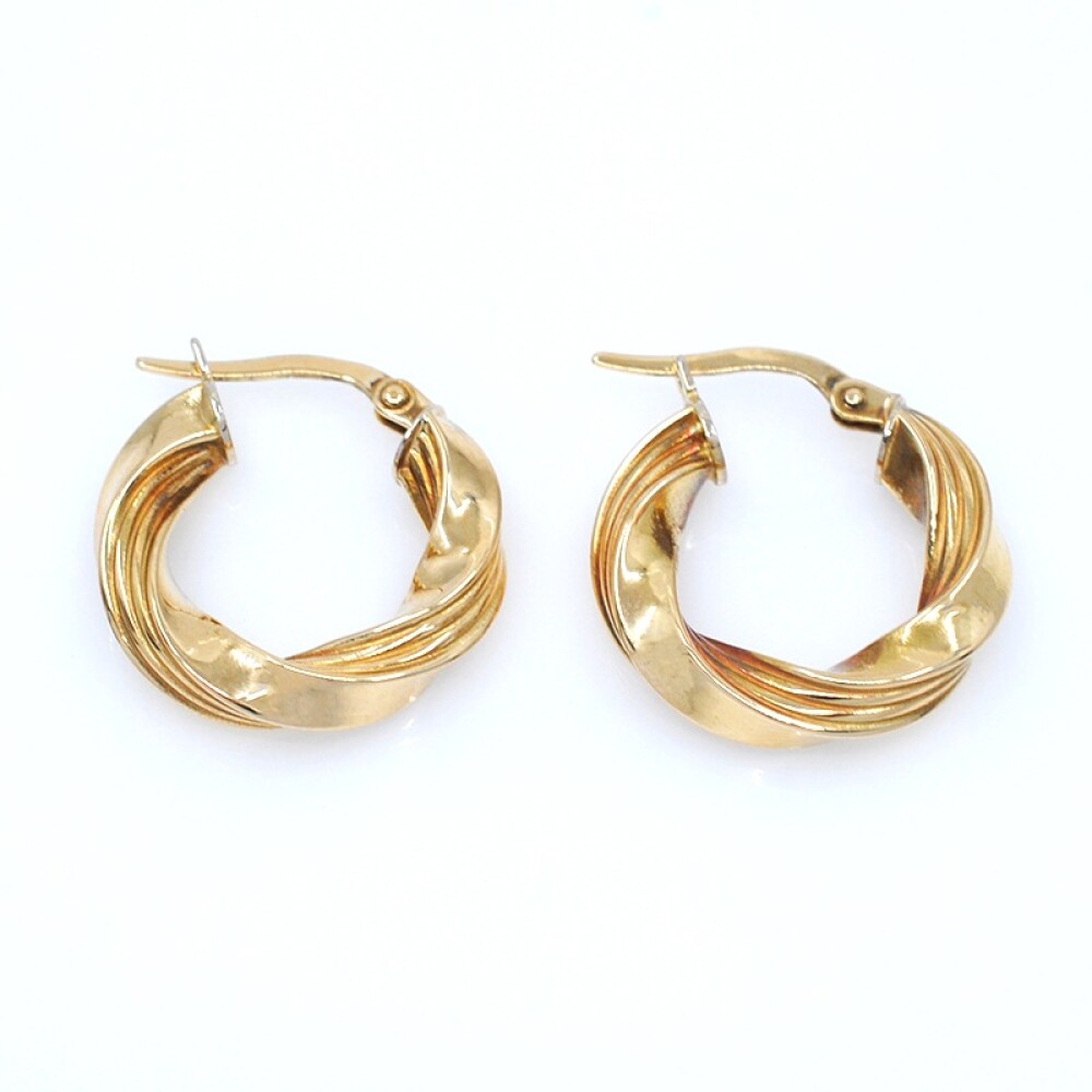 Aros torneados en oro 18k amarillo Aros torneados en oro 18k amarillo