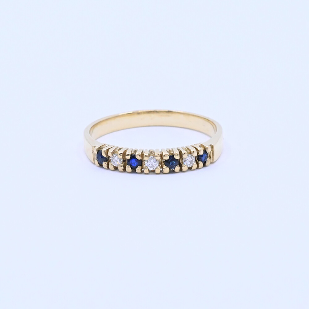 Anillo medio sin fin oro 18k amarillo con 4 zafiros y 3 brillantes. Anillo medio sin fin oro 18k amarillo con 4 zafiros y 3 brillantes.