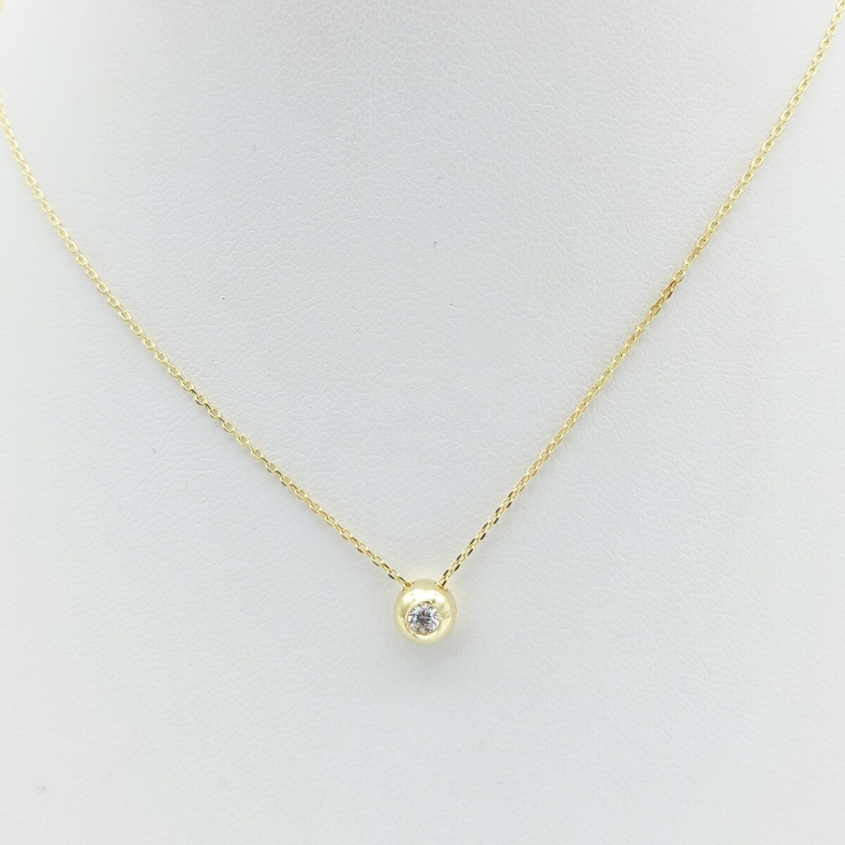 Cadena de oro 10 ktes con colgante de circonia, PuNTO DE LUZ. 