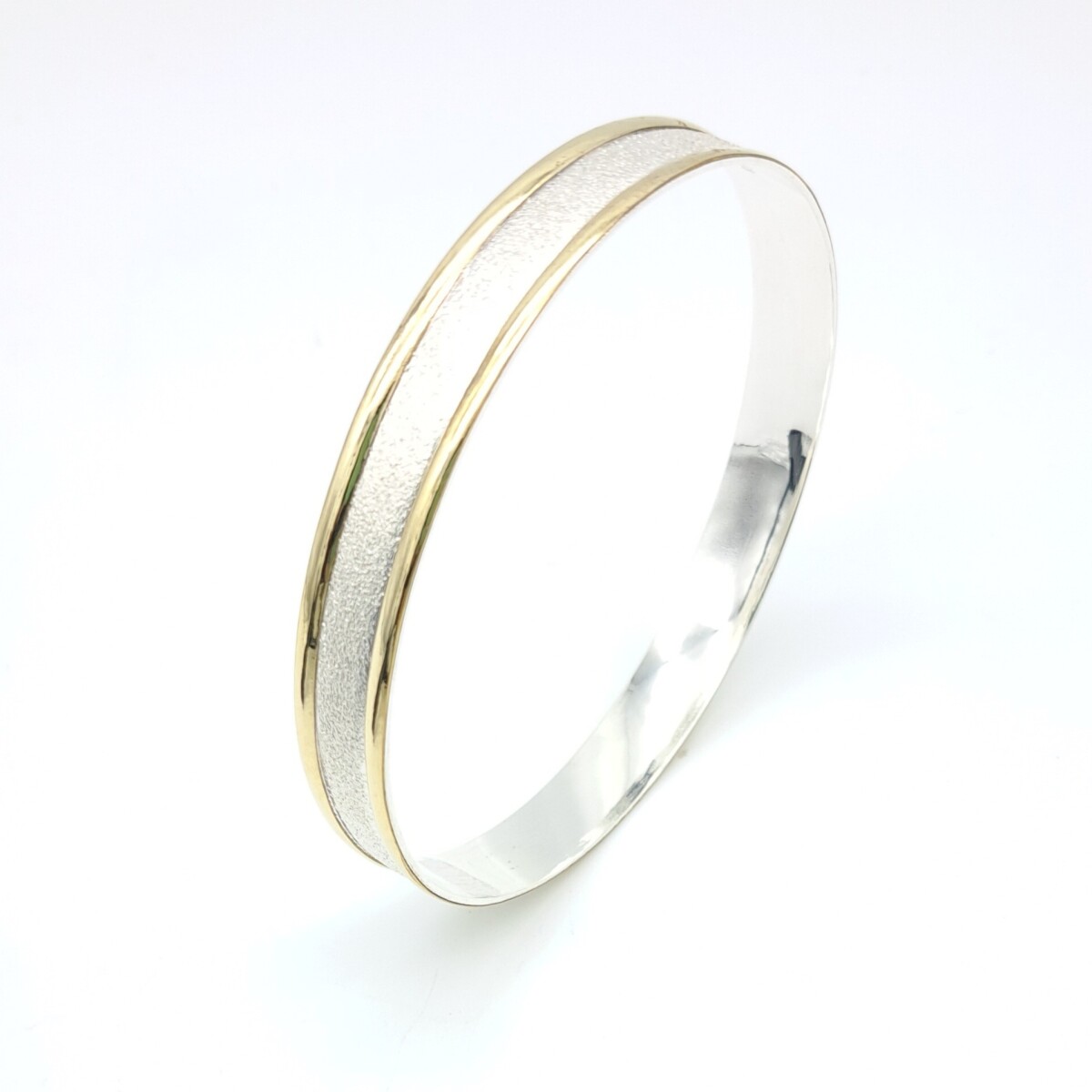Esclava de plata 925 y double en oro 18 ktes. 
