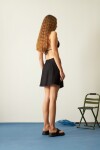 Falda con piedras negro