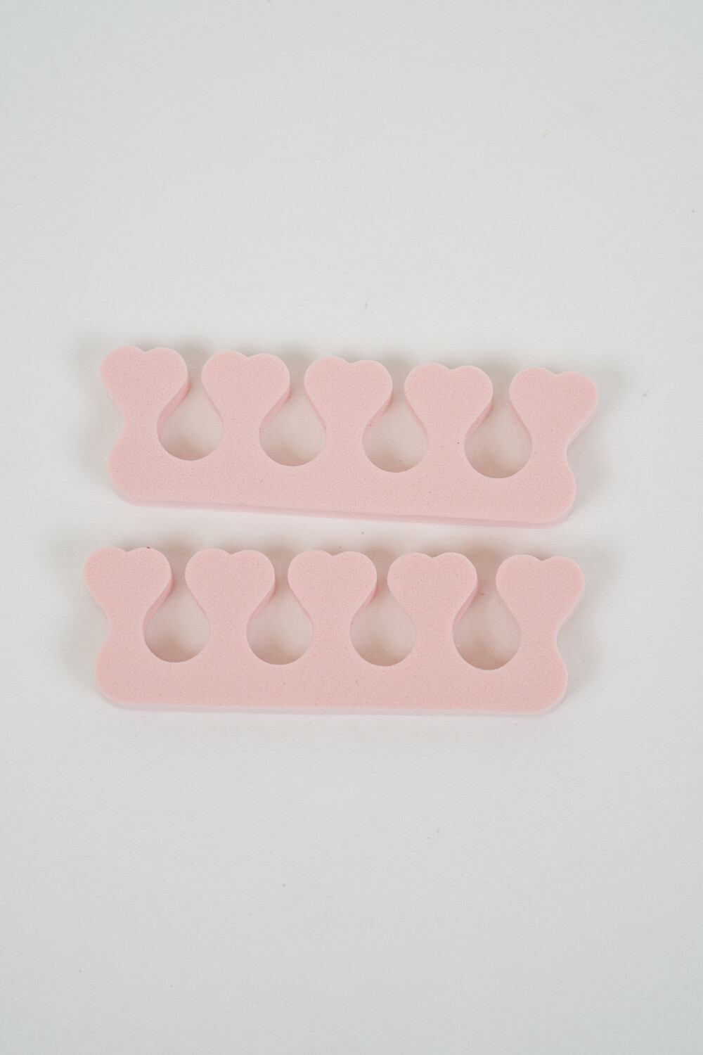 Separador De Dedos Teks Rosa