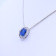 Colgante oro 18k blanco con zafiro azul oval y brillantes. Colgante oro 18k blanco con zafiro azul oval y brillantes.