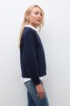Sweater oversized con bolsillo bordado azul marino