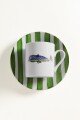 Taza de café con plato selva marina