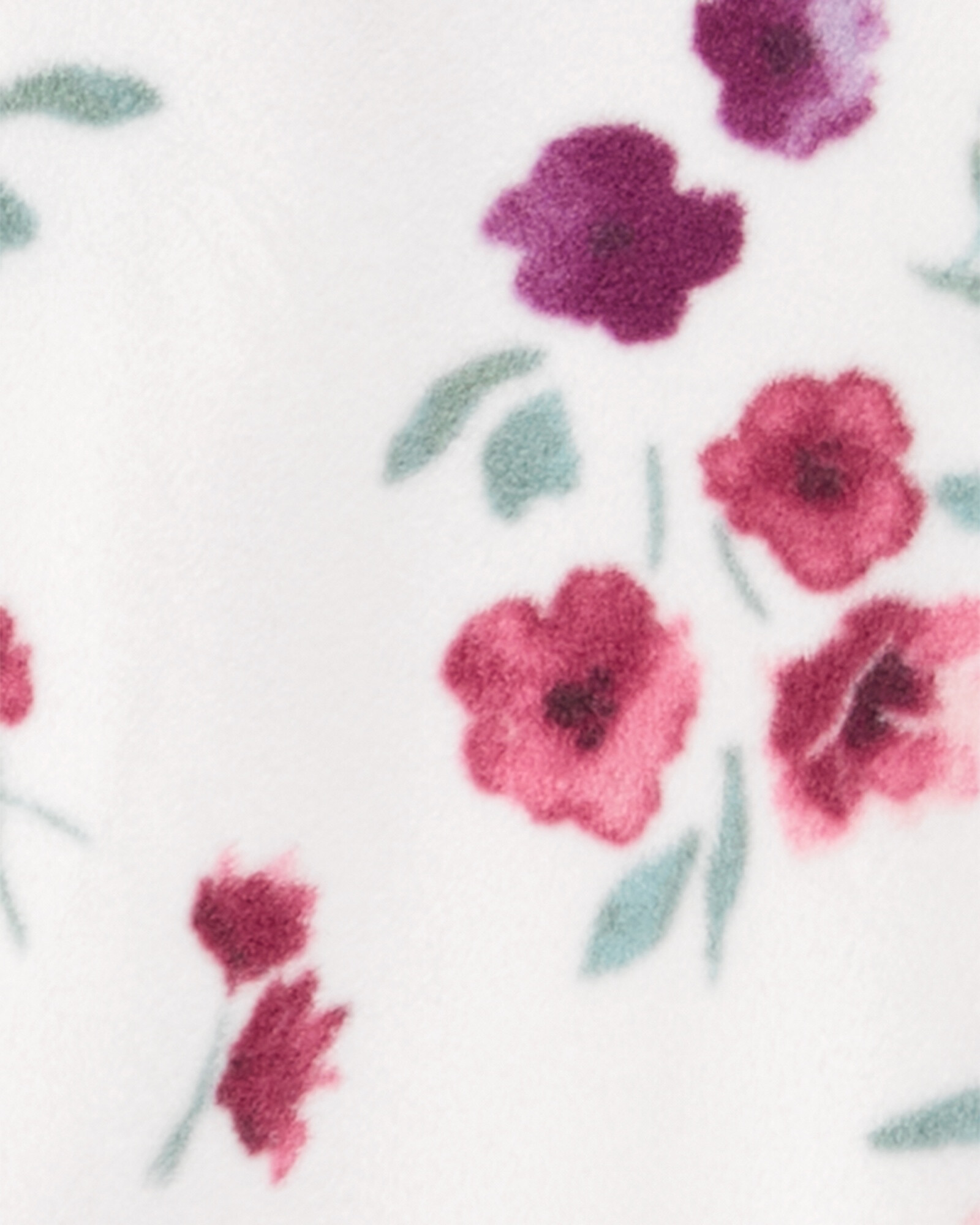 Pijama uno pieza de micropolar, con pie, blanco, diseño floral. Talles 2-5T Pijama uno pieza de micropolar, con pie, blanco, diseño floral. Talles 2-5T