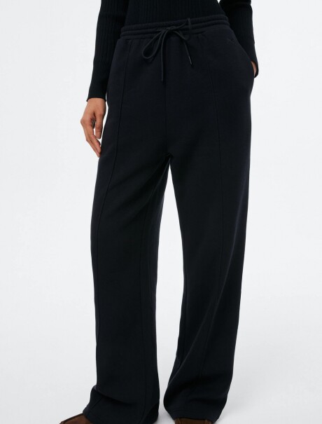 PANTALÓN CON BOLSILLOS - BLANCO NEGRO